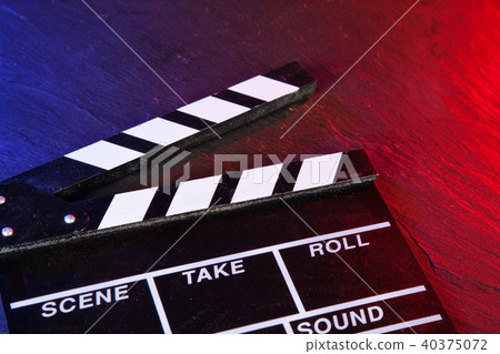 Cinema clapboard on black stone Cinema clapboard on black stone 40375072