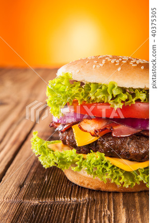 Fresh hamburger on wooden planks Fresh hamburger on wooden planks 40375305