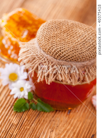 Fresh honey in jar Fresh honey in jar 40375418