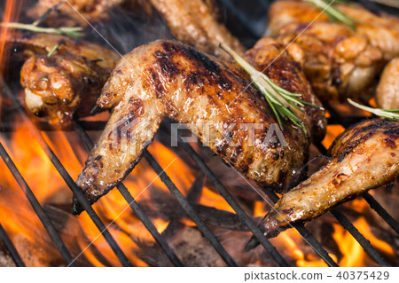 Grilled chicken wings on fire 40375429