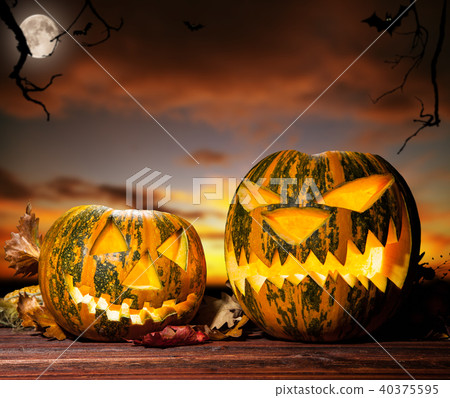 Halloween pumpkins with evening sky on background 40375595
