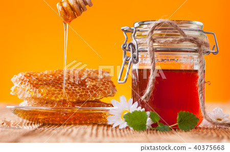 Fresh honey with dipper Fresh honey with dipper 40375668