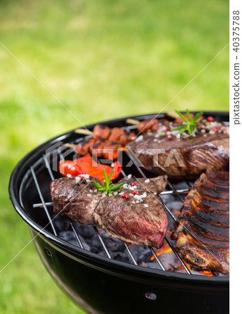 Barbecue grill with various kinds of meat Barbecue grill with various kinds of meat 40375788