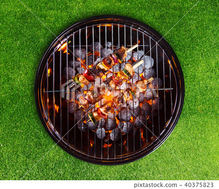 Barbecue grill with skewers Barbecue grill with skewers 40375823