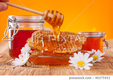 Fresh honey with dipper Fresh honey with dipper 40375931