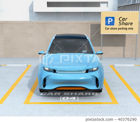 Front image of an electric SUV parked in a car sharing private parking lot 40376290