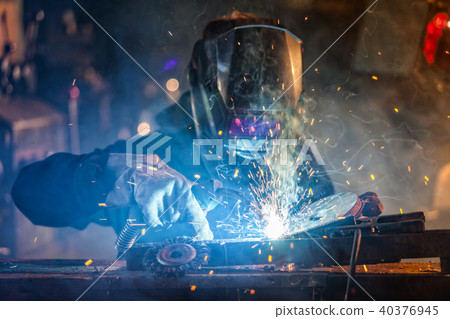 Welder in action. Low depth of focus 40376945