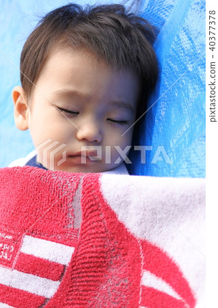 A nap with a blue seat (1 year old boy) A nap with a blue seat (1 year old boy) 40377378