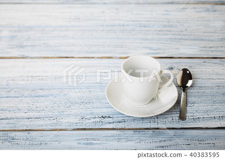 white coffe cup on light wooden background white coffe cup on light wooden background 40383595