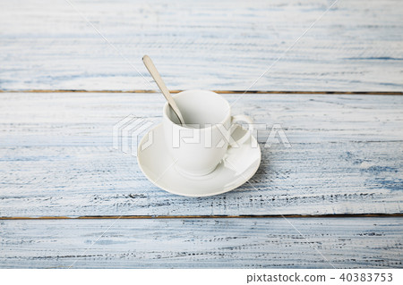 white coffe cup on light wooden background white coffe cup on light wooden background 40383753