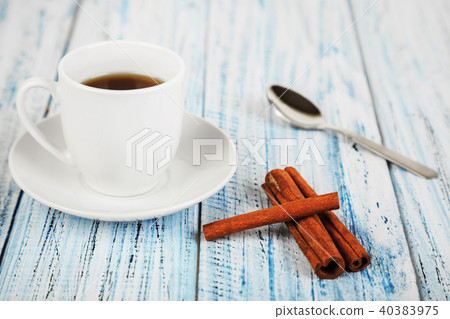 white coffe cup on light wooden background white coffe cup on light wooden background 40383975