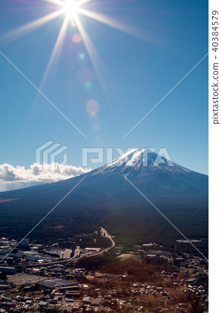 Mount Fuji in winter season with sun like a Star Mount Fuji in winter season with sun like a Star 40384579