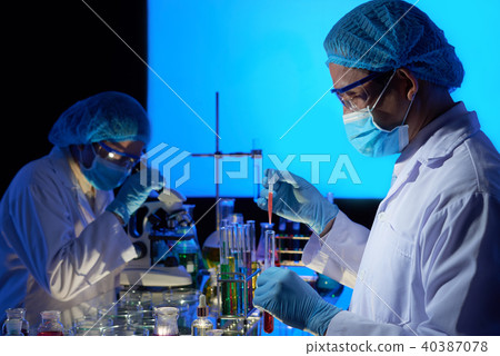 Asian Scientists Working on Vaccine Creation Asian Scientists Working on Vaccine Creation 40387078