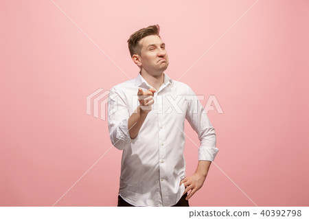 The happy business man point you and want you, half length closeup portrait on pink background. The happy business man point you and want you, half length closeup portrait on pink background. 40392798