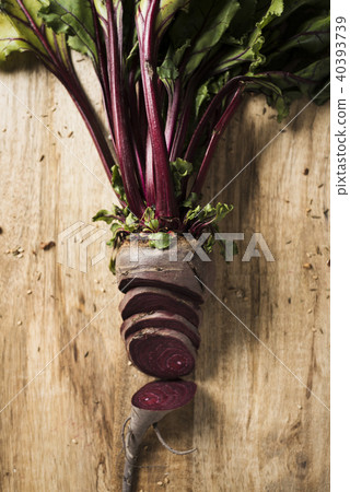 raw beetroot on a rustic wooden table 40393739