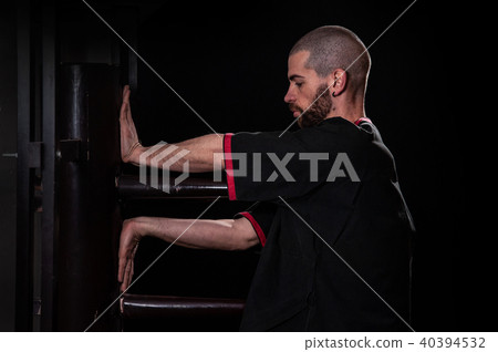 martial arts of Wing Tsun, Caucasian with kimono martial arts of Wing Tsun, Caucasian with kimono 40394532