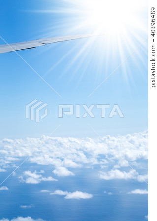 Aerial view from plane on wing and clouds 40396489
