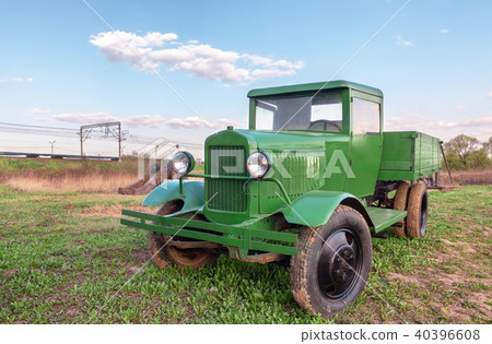 Vintage retro soviet green truck in the field 40396608