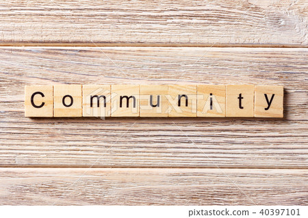 Community word written on wood block. Community word written on wood block. 40397101