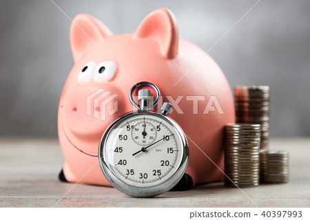 Piggy bank on grey background Piggy bank on grey background 40397993