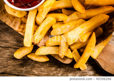 French fries on wooden table French fries on wooden table 40398266