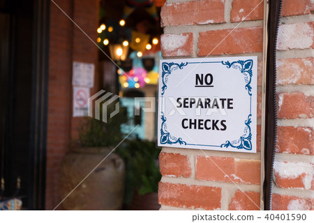 No Separate Checks Sign at Restaurant No Separate Checks Sign at Restaurant 40401590