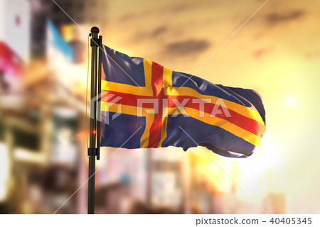 Aland Islands Flag Against City Blurred Background 40405345