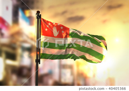 Abkhazia Flag Against City Blurred Background 40405366