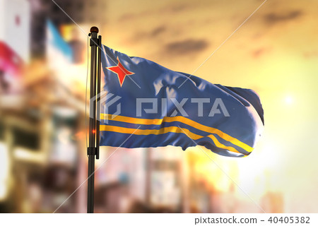 Aruba Flag Against City Blurred Background Aruba Flag Against City Blurred Background 40405382