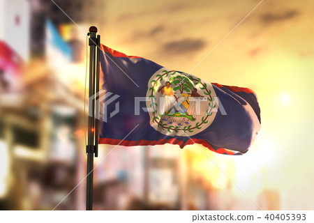 Belize Flag Against City Blurred Background 40405393