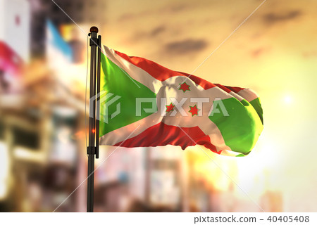 Burundi Flag Against City Blurred Background 40405408