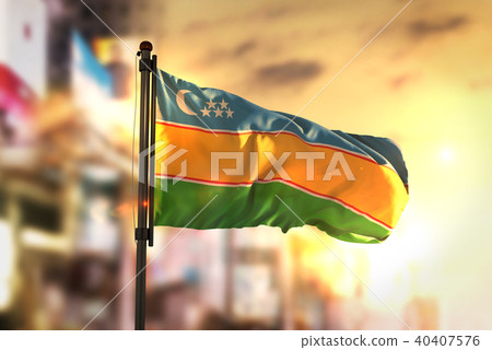 Karakalpakstan Flag Against City Blurred 40407576