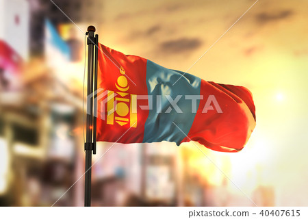 Mongolia Flag Against City Blurred Background 40407615