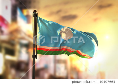 Sakha Republic Flag Against City Blurred 40407663