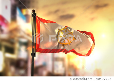 Sikkim Flag Against City Blurred Background Sikkim Flag Against City Blurred Background 40407792