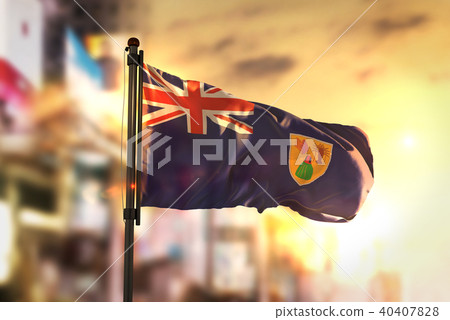 Turks and Caicos Islands Flag Against City Blurred Turks and Caicos Islands Flag Against City Blurred 40407828