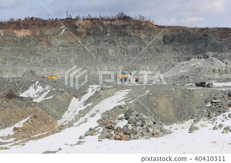 Extraction of minerals by open pit, quarry 40410311