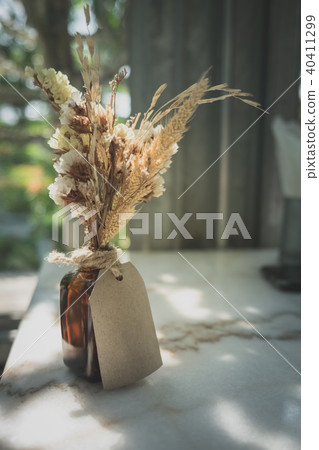 dried wheat grass vase decorated on table 40411299