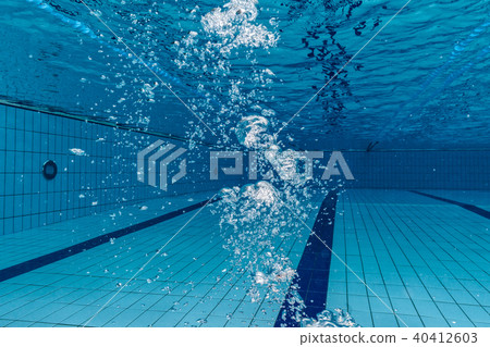 Air bubbles in clear blue water in pool Air bubbles in clear blue water in pool 40412603