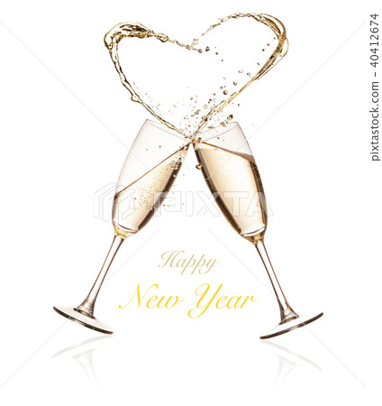 Glasses of champagne with splashing heart on white Glasses of champagne with splashing heart on white 40412674