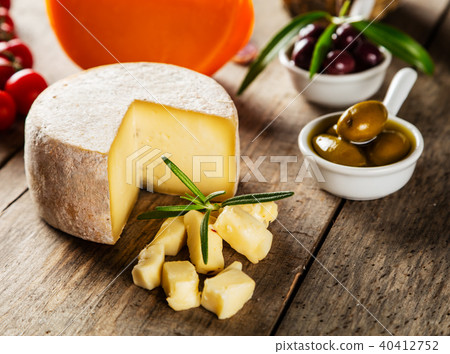 Traditional italian cheese placed on wood Traditional italian cheese placed on wood 40412752
