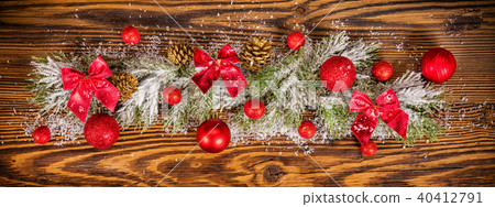 Christmas decoration with fir branches on wood Christmas decoration with fir branches on wood 40412791