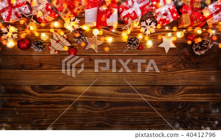 Christmas background with gifts and wooden decorations 40412796