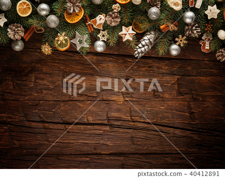 Christmas fir tree with decoration on a wooden board Christmas fir tree with decoration on a wooden board 40412891
