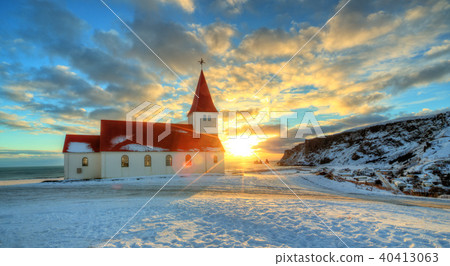Typical red colored wooden church in Vik town, Iceland 40413063