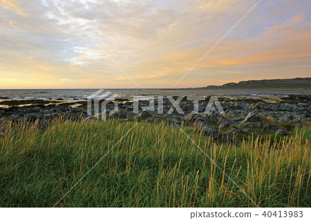 Beautiful view of the coast of the Barents sea, near Hamningberg, Norway Beautiful view of the coast of the Barents sea, near Hamningberg, Norway 40413983