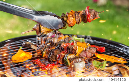 Meat skewer on grill Meat skewer on grill 40414120