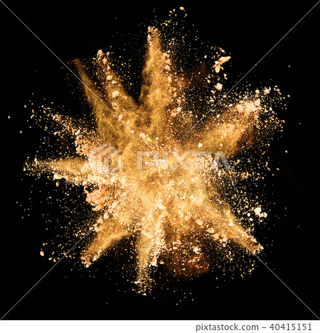 Explosion of brown powder on black background Explosion of brown powder on black background 40415151