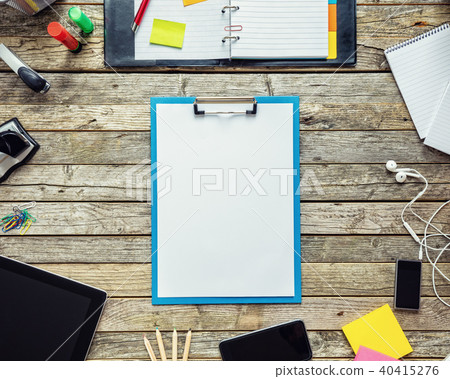 Blank desk sheet on office table 40415276
