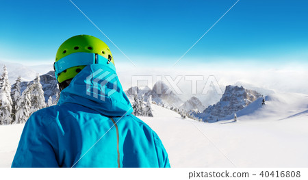 Skier backside view on beautiful landspace Skier backside view on beautiful landspace 40416808